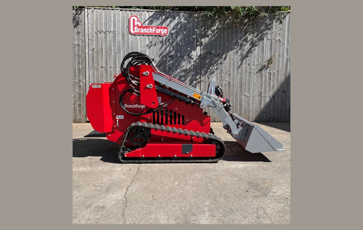 Mini skid steer side profile showing the loader arm geometry