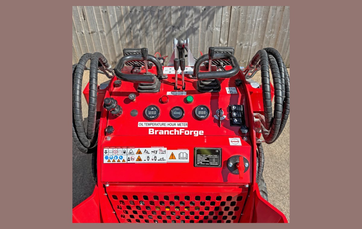 Operator panel with oil temperature and hour meter